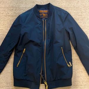 Navy bomber windbreaker with gold accents